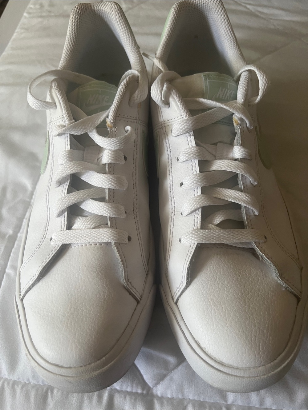 Nike White Low-Top Sneakers with Pale Green Accent
